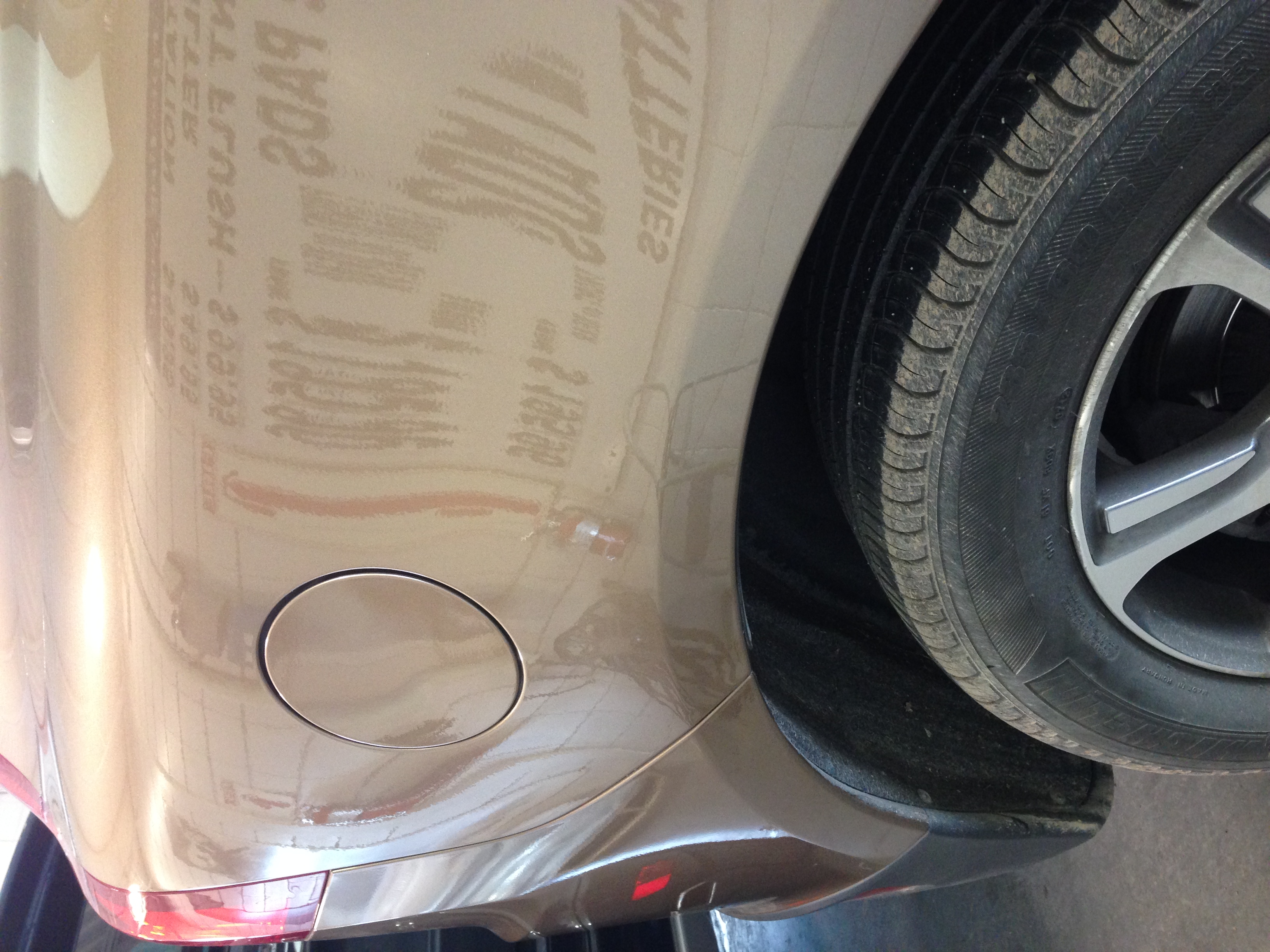 After rear quarter impact repair near wheel arch