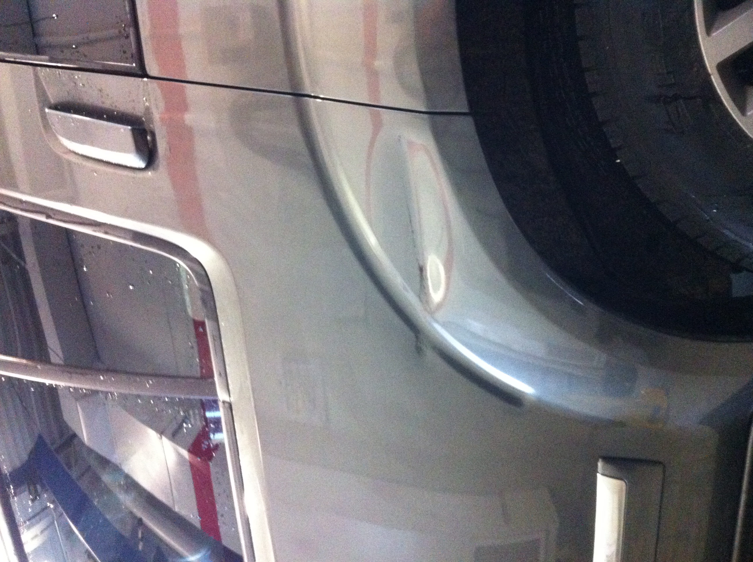 Before rear panel distortion near wheel area