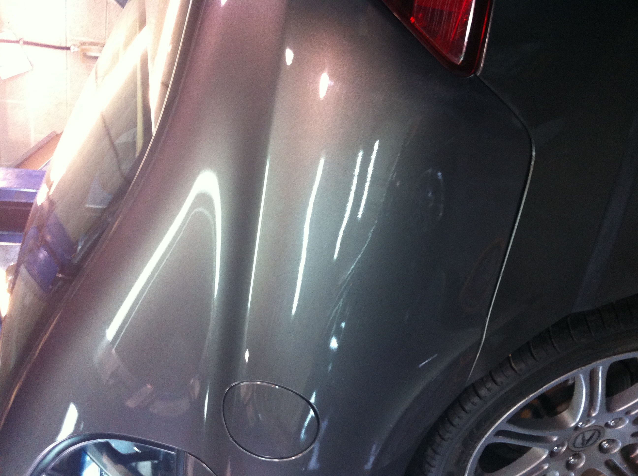 After sharp rear quarter dent repair