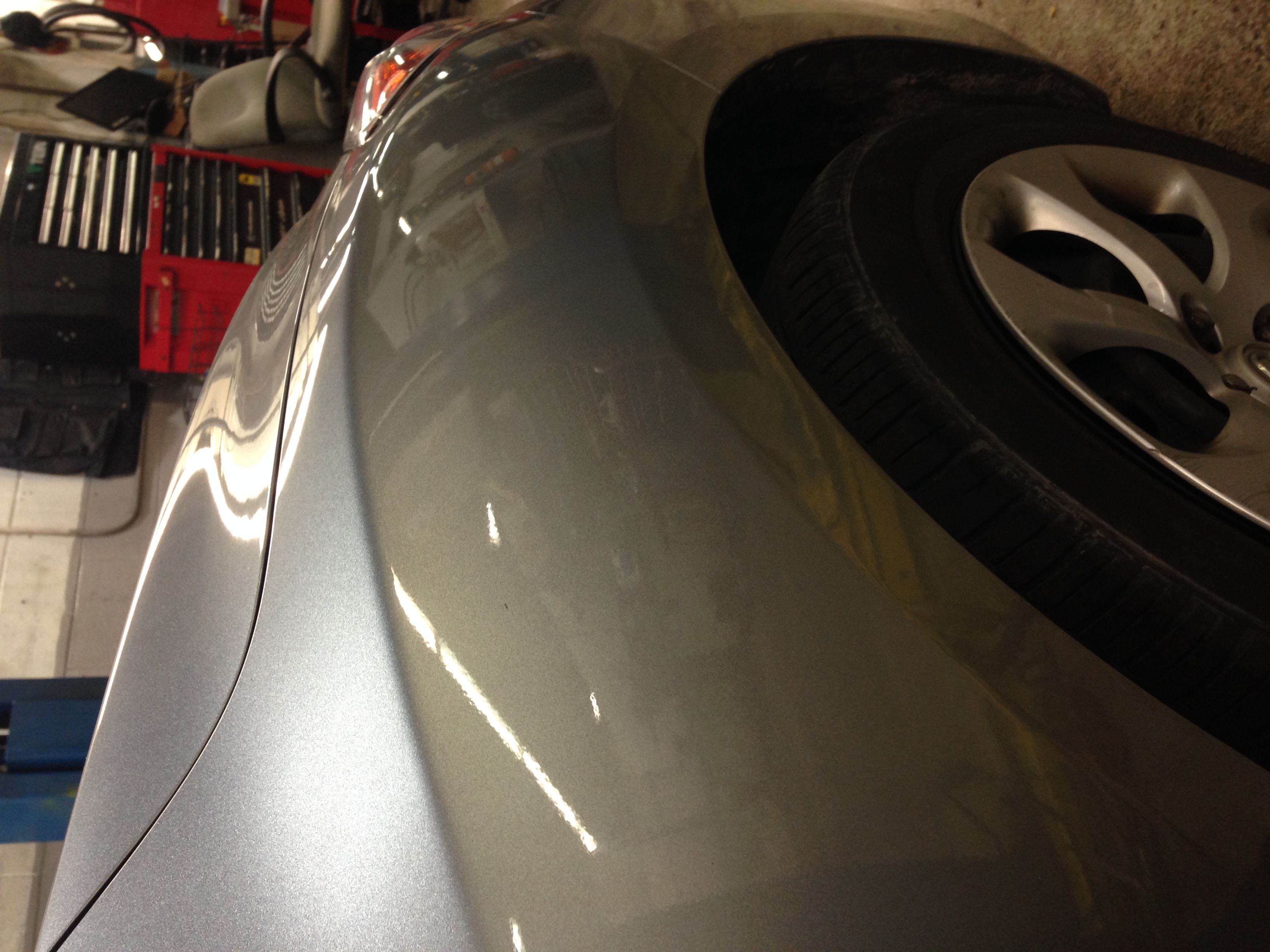 After broad front fender distortion repair