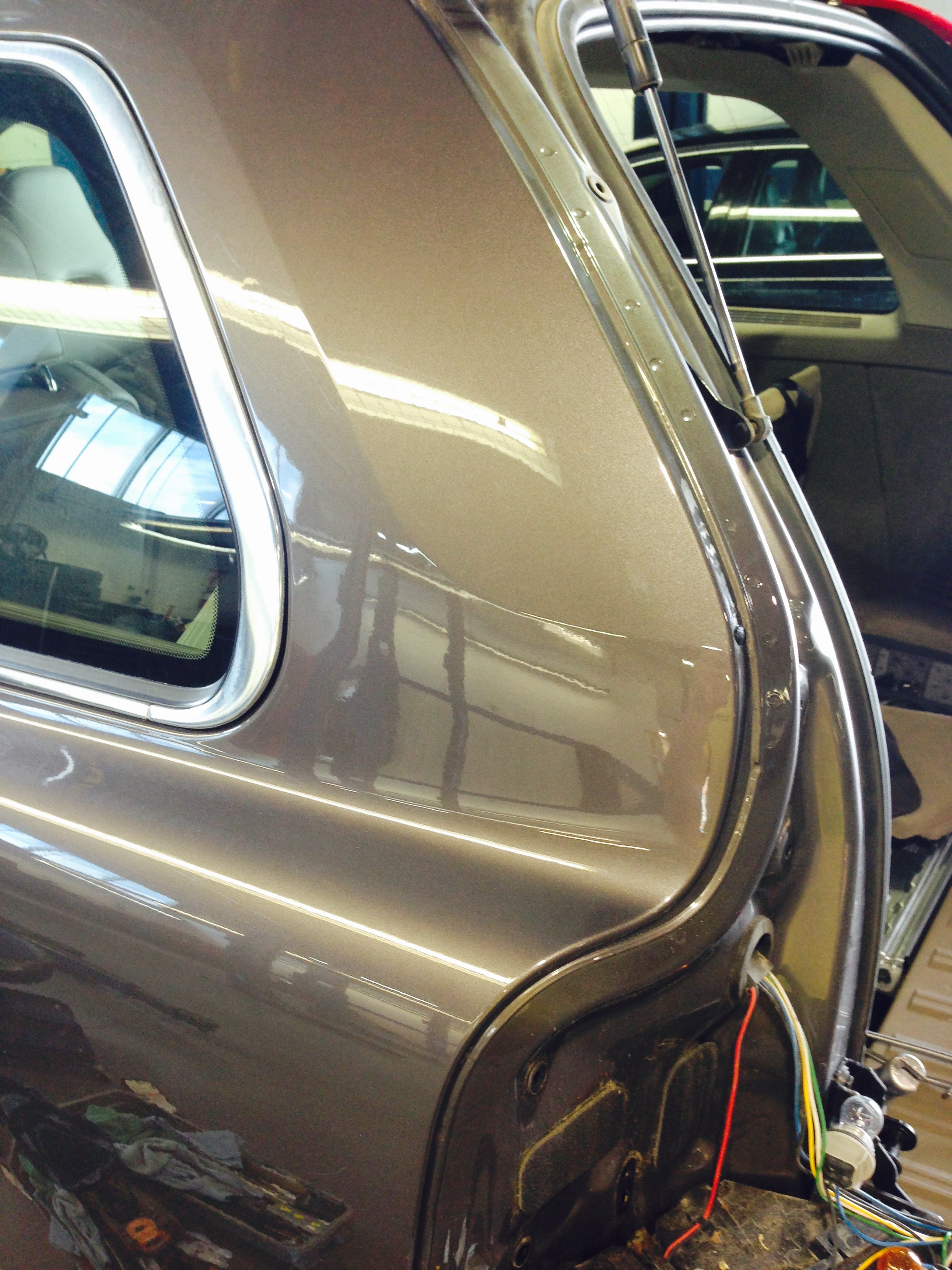 After rear quarter hatch-side crease repair